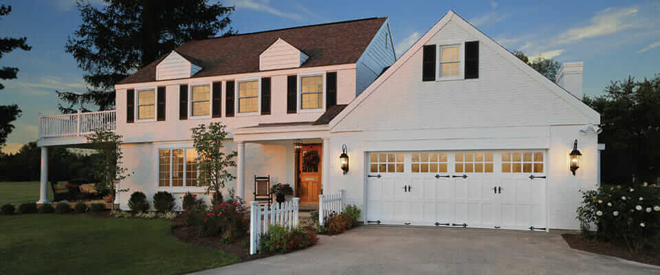 Clopay Reserve Wood Collection white garage doors